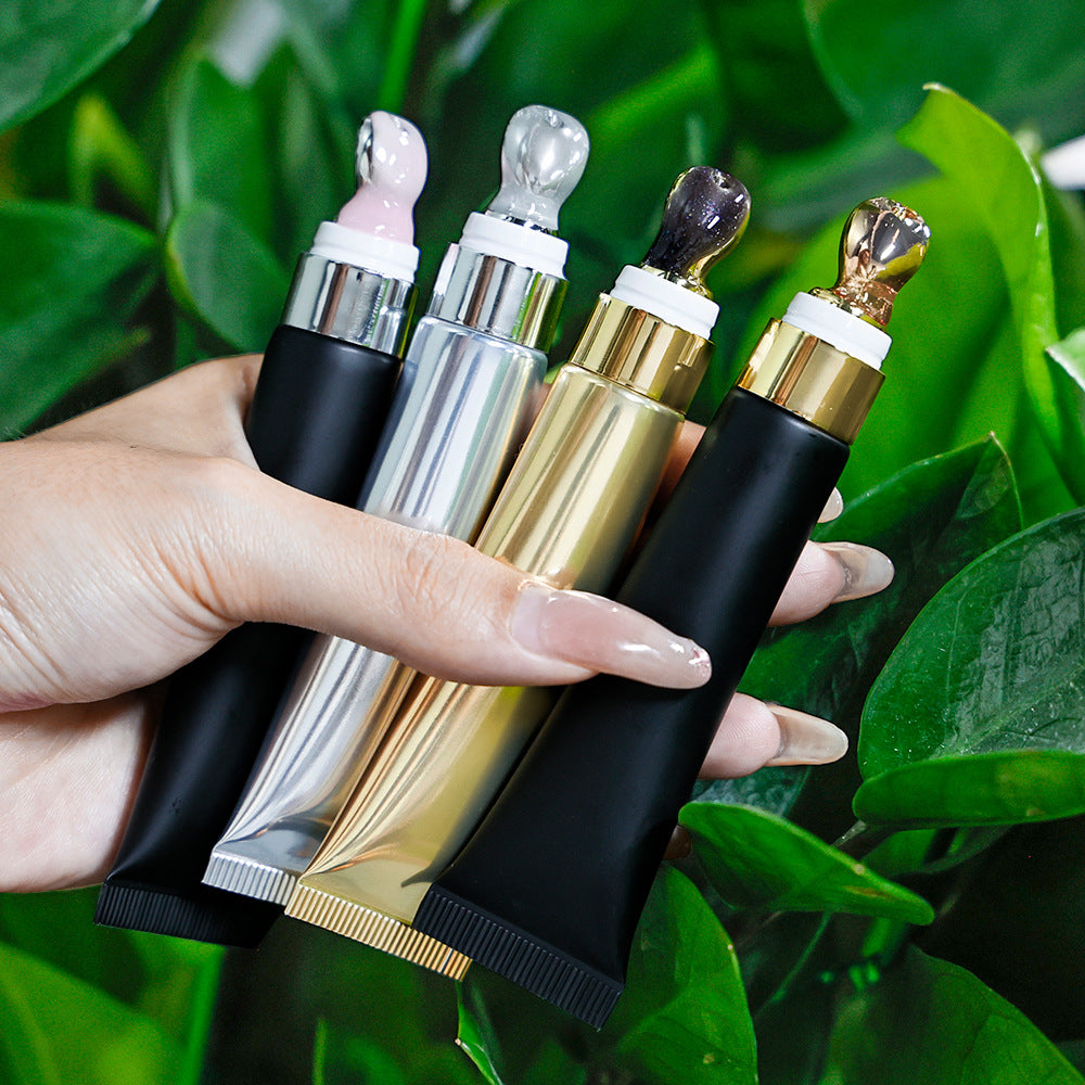 eprolo Squeeze Tube Plumping Lip Oil in 15ml, moisturizing tinted lip gloss with a clear tube and applicator brush