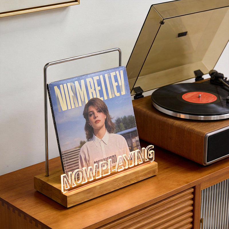 Wooden vinyl record stand by eprolo holding a vinyl record, desktop album display and CD rack for home, cafe, or office decor.