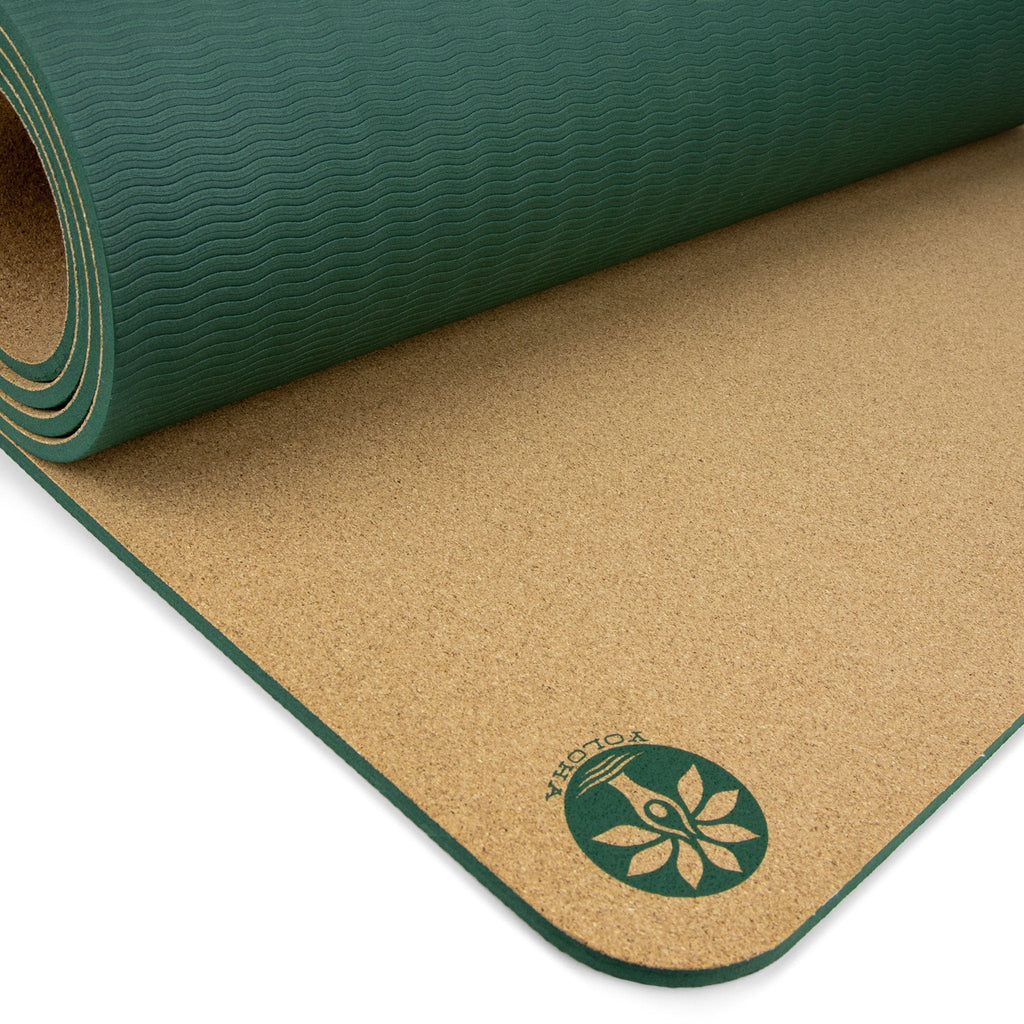 Close-up of Yoloha Yoga Infinite Bloom Aura Cork Yoga Mat showing textured cork surface and patterned design for yoga and Pilates practice.