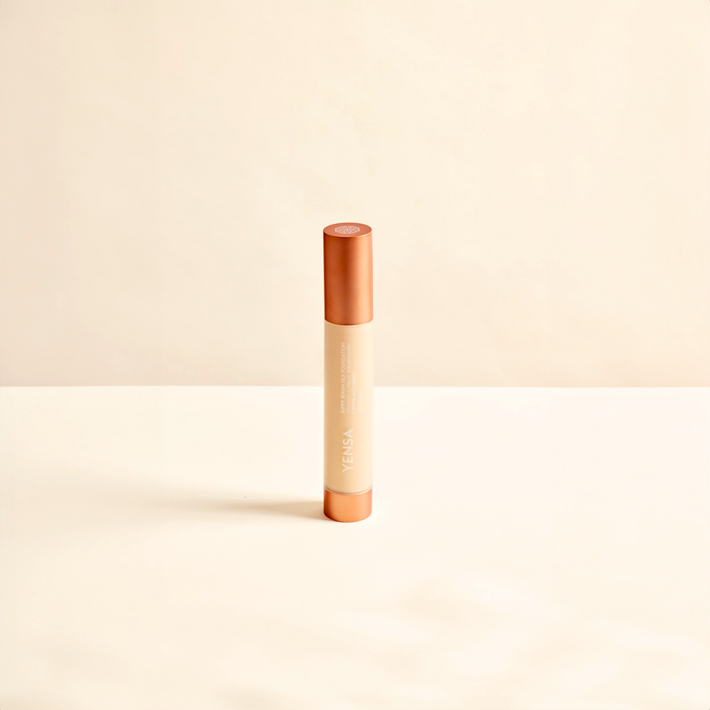 Fair shade YENSA Super Serum Silk Hydrating Peptide Foundation for radiant, glowing skin, shown in a sleek foundation bottle.