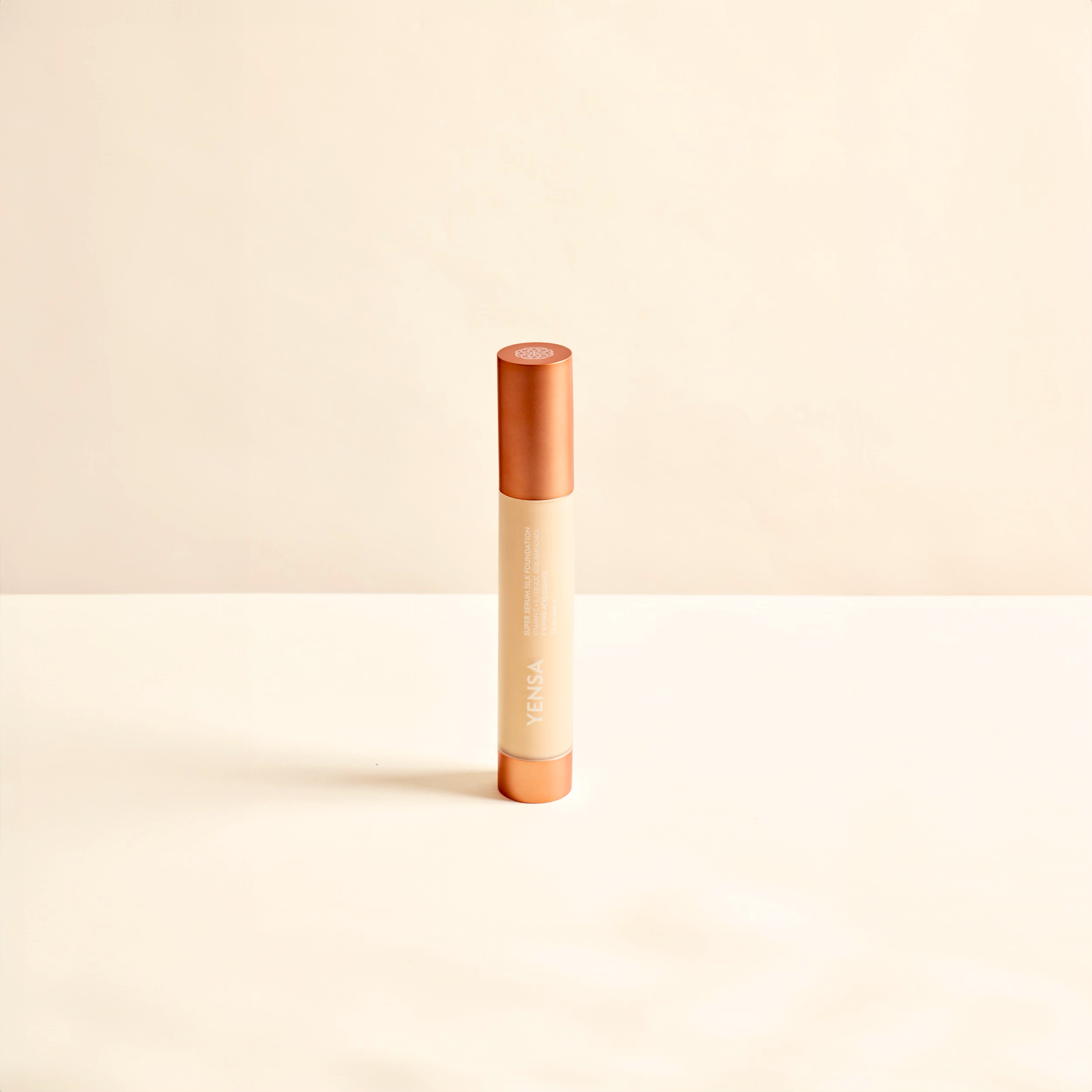 Fair shade YENSA Super Serum Silk Hydrating Peptide Foundation for radiant, glowing skin, shown in a sleek foundation bottle.
