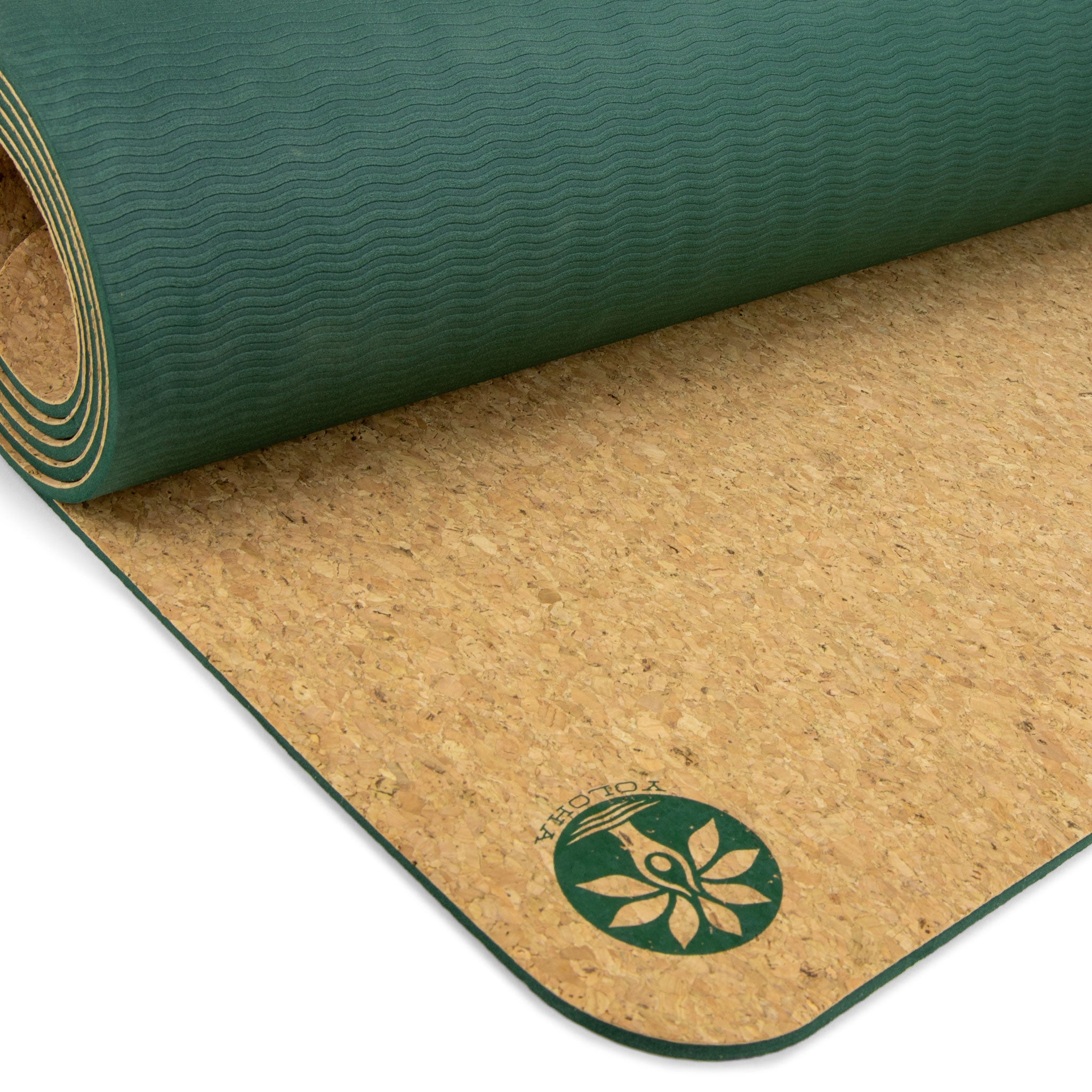 Close-up of the Swirly Flow Nomad Cork Yoga Mat by Yoloha Yoga showing textured cork surface and intricate swirl pattern.